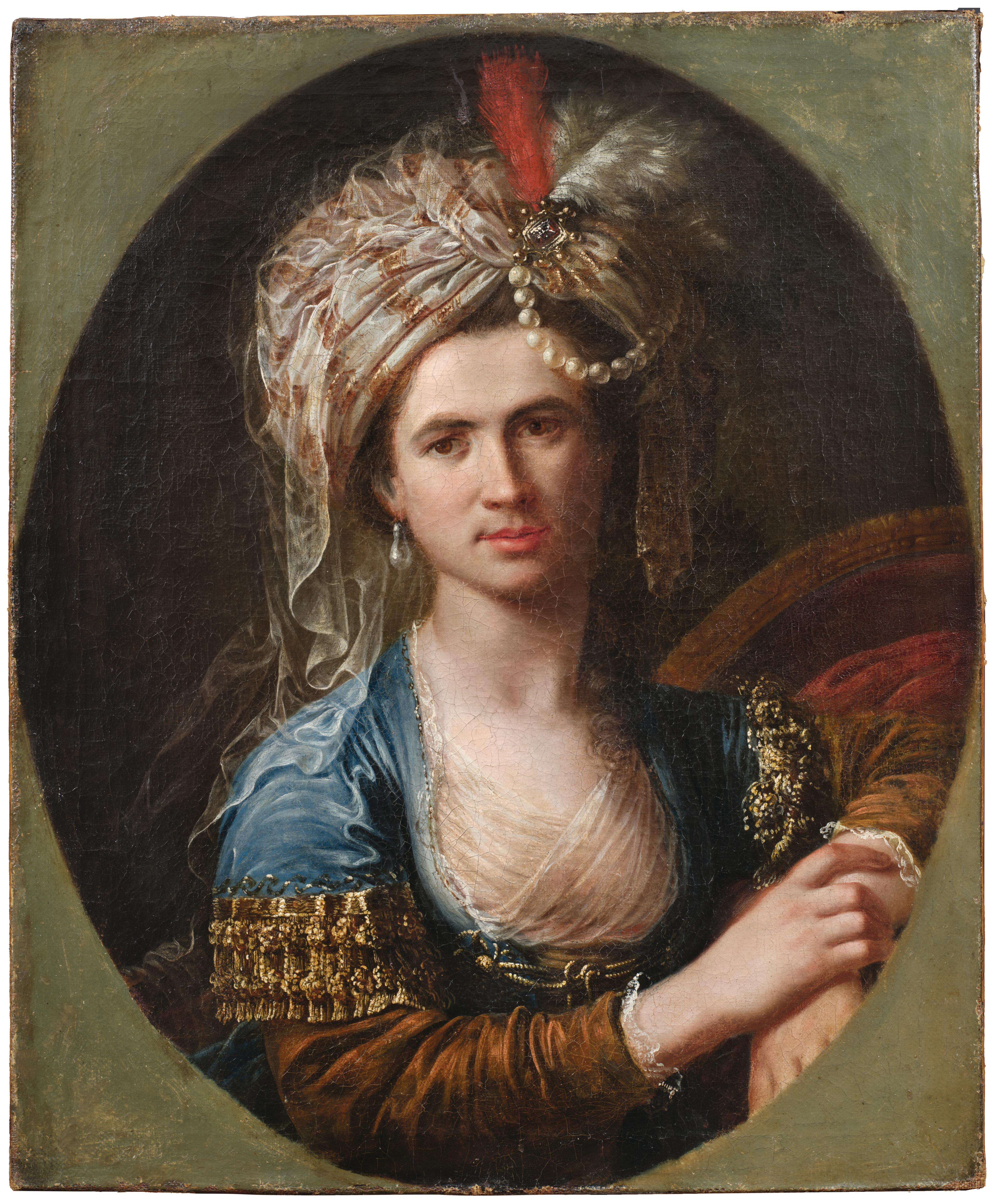 Portrait of a man, bust-length, traditionally identified as Charles d’Eon de Beaumont, called Le Chevalier d’Eon (1728–1810), in women’s dress and a turban decorated with pearls, in a painted oval,
oil on canvas, 63.5 x 52.5 cm